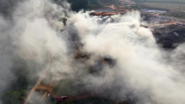 Aerial drone footage of landfill fire and smoke