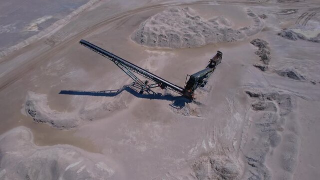 Aerial view of mining sector field. Concept of rapid expanding global market for semiconductors, and supply chains for AI systems and data centres. Rear earth development demand by memory chip makers.