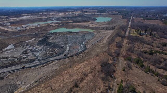Terrestrial Canadian landscape of rare earth mining site. Critical rare earth minerals excavate for Artificial intelligence AI technology, weapons and electric vehicles. Deep underground Industry.