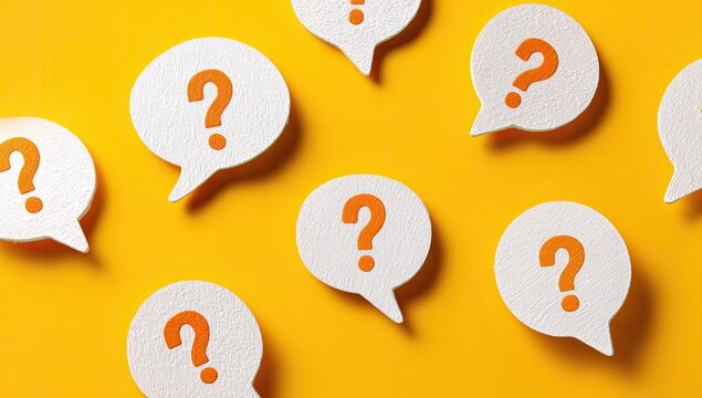 Scattered Question Marks in Speech Bubbles on Yellow Background.