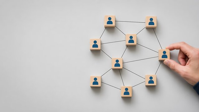 Conceptual network illustration wooden figures connected by lines representing relationships and collaboration