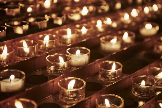 Votive candles in the Milan Cathedral (Duomo di Milano), the largest church in Italy and one of the largest Gothic style churches in the world, Milan, Italy, Europe 