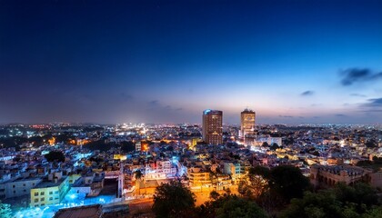 Fototapeta premium a breathtaking panoramic night view of hyderabad showcasing its modern skyline and historic landmarks glowing in city lights