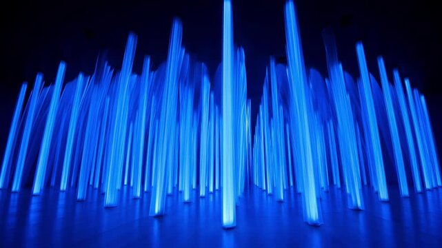 Abstract digital visualization of glowing blue neon vertical bars on dark background, creating a futuristic tech atmosphere with light reflection effects.