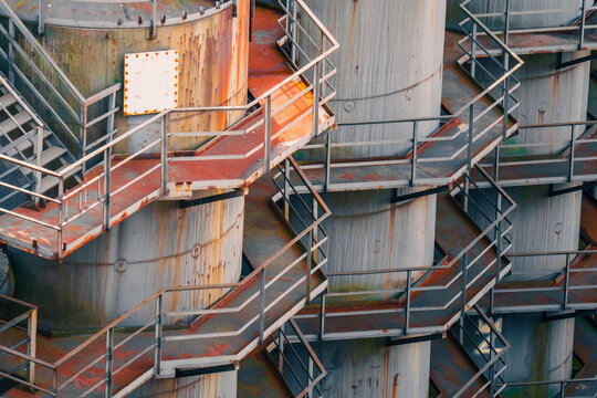 Industrial factory complex steel pipes metal machinery structure wallpaper background