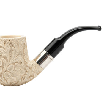 Classic bent meerschaum pipe with ornate floral carvings, black mouthpiece and a polished silver band against a transparent background, timeless sophistication