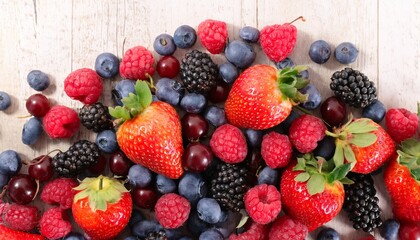 Obraz premium colorful berry mix for healthy eating from above
