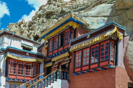 Takthok Monastery cave temple in Ladakh India, colorful Tibetan Buddhist architecture built into rock, sacred Himalayan spiritual place