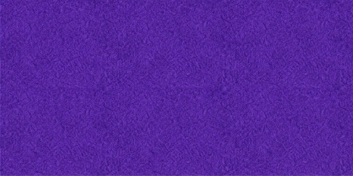Pink and purple leather textile patterns blend with soft violet fabric textures to create a vintage grunge material surface for a colorful design backdrop