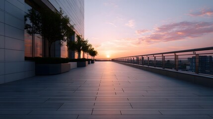 Obraz premium A modern rooftop overlooking a vast urban landscape bathed in the dramatic light of sunset showcasing contemporary architecture and natural serenity