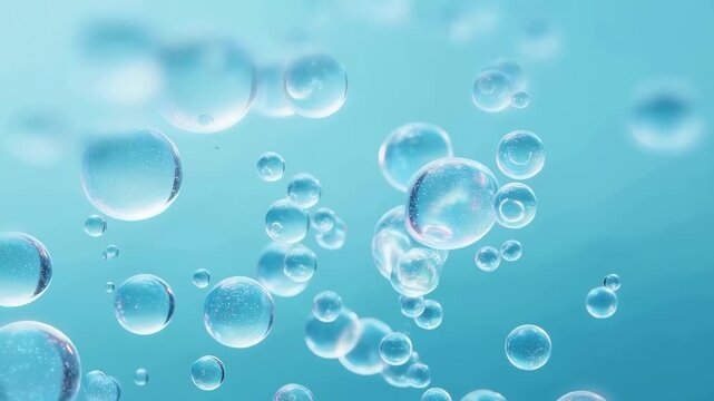 Bubbles rising in clear blue water, creating a serene and refreshing underwater atmosphere. Ideal for projects related to nature, relaxation, and purity