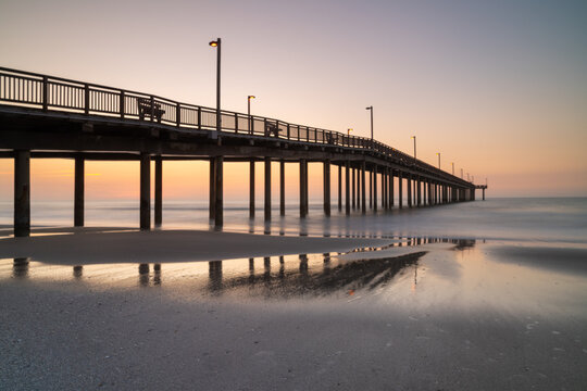 view of the Springmaid Pier in Myrtle Beach at sunrise