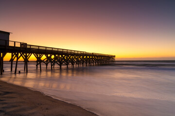 Fototapeta premium sunrise at Crystal Pier in Wrightsville Beach in North Carolina