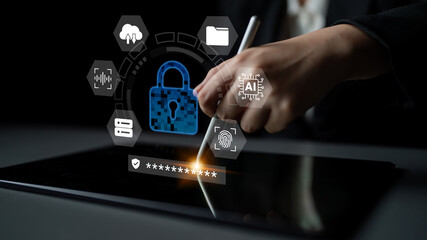 Fototapeta premium A close-up image of a hand signing a digital document on a tablet, illustrating concepts of security and technology with visual symbols related to cybersecurity and data protection. Ledger