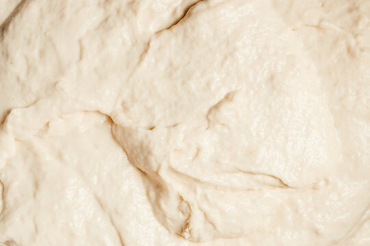 Creamy dough texture background soft organic surface baking concept top view