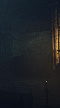 A dimly lit area within an old building shows gates and shadows on the walls. Light comes from a small opening, highlighting the atmosphere in the space.