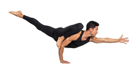 Obraz premium A man in black athletic wear performing a challenging yoga pose in mid-air