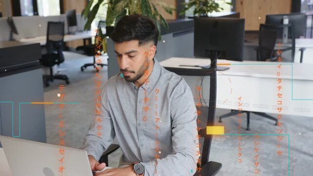 Man stopping typing and reaching for phone while teal UI overlaying in business, checking messages