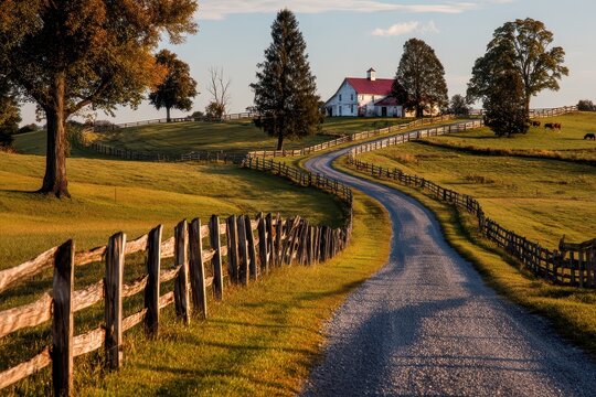 Pastoral bluegrass countryside with a white barn, red roof, and fence line by a country road