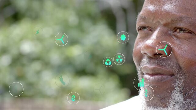 Senior man yard gazing as icon appearing left starting icons drifting over face visualizing energy
