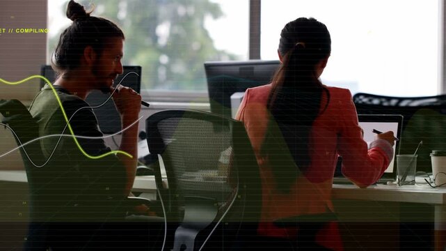 Vertical video: Woman typing on tablet man watching reviewing COMPILING lines moving over tech desk