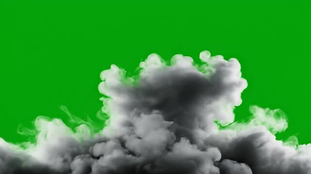 A video captures a large gray cloud against a green screen background.