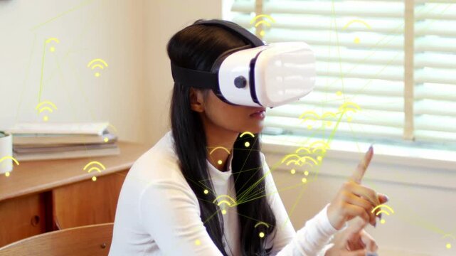 Woman with VR HMD raising hand, managing interface, yellow nodes mapping data around hands for tech