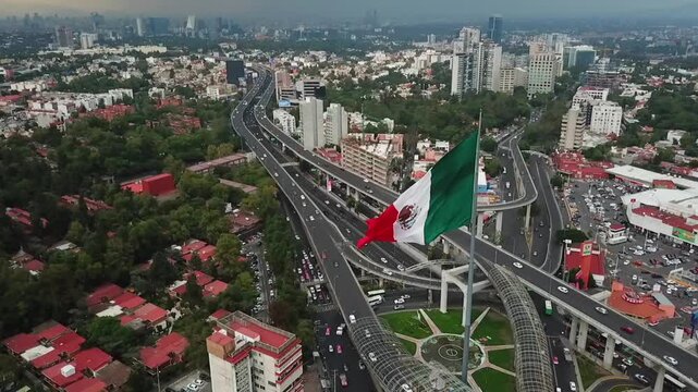 Aerial view of the Mexican flag waving in Mexico City