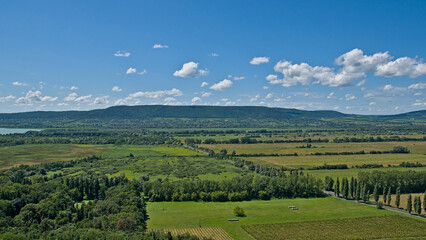 Fototapeta premium Sunny summer landscape with meadows and hills on a sunny summer day near Keszthely, Hungary 