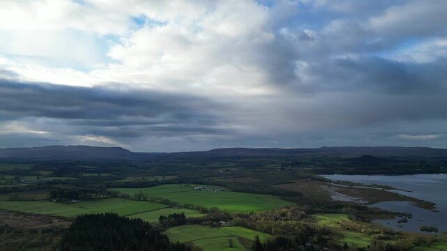 Aerial View of Balmaha Valley Glasgow Landscape over Mountains of UK During Sunset Time. The village is a popular tourist destination for picnickers and day trippers from Glasgow Scotland, UK
