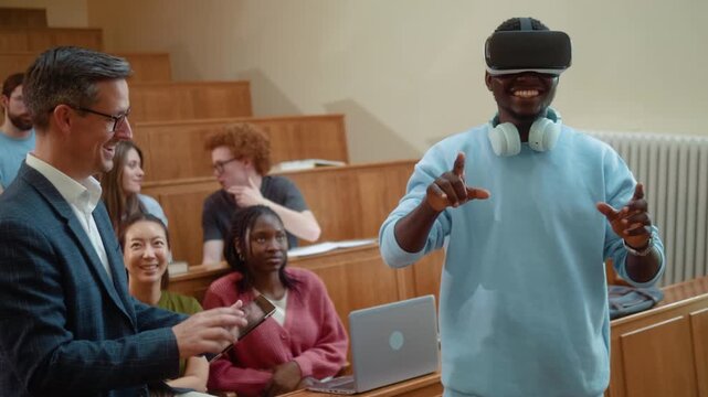 Professor with digital tablet guiding African student using VR headset during university class. Diverse students observe immersive learning experience with laptop and modern education technology.