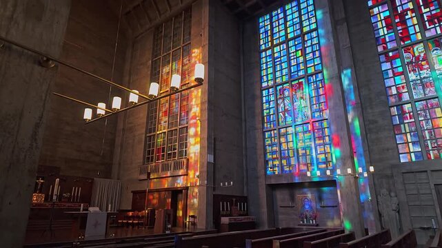 Modern church interior with stained glass light in Basel