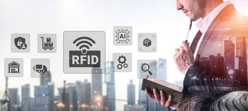 A business professional reflects on RFID technology amidst a modern city skyline, emphasizing innovation in logistics, data management, and digital transformation strategies. Ledger