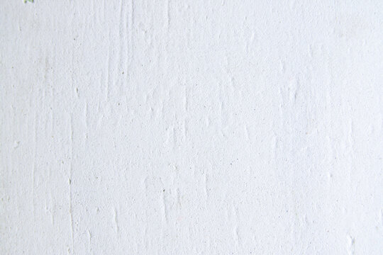 Detailed view of plaster layer on wall showing repair process and surface preparation. Suitable for architecture, renovation, and building maintenance visuals.