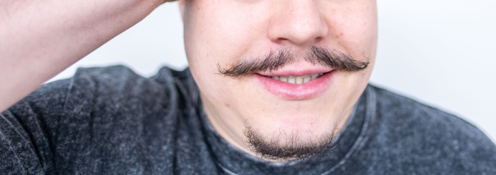 handsome middle-aged man with elegant, well-groomed mustache and serious expression, classic style, Authentic male portrait confidence, mature masculinity, self confident, Gentlemanly style male face