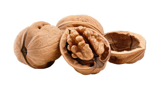 Whole and cracked walnuts with exposed kernels, isolated on transparent background