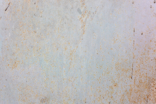 Rusty metal surface texture with scratches and stains, industrial background