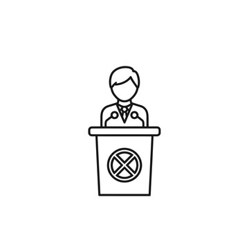 A person giving a speech at a podium.