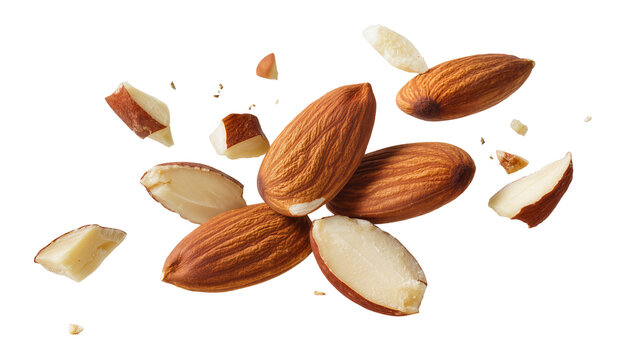 Whole and broken almonds flying in motion, isolated on transparent background