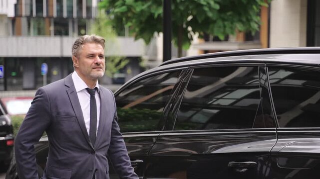 Ault man walking near his car in the city. Real time concept