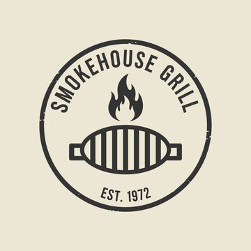 Vintage Smokehouse Grill Emblem with Flames and Grill Design.