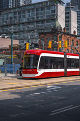 Naklejka premium Toronto streetcar - red and white public transport tram - Toronto, Ontario, Canada