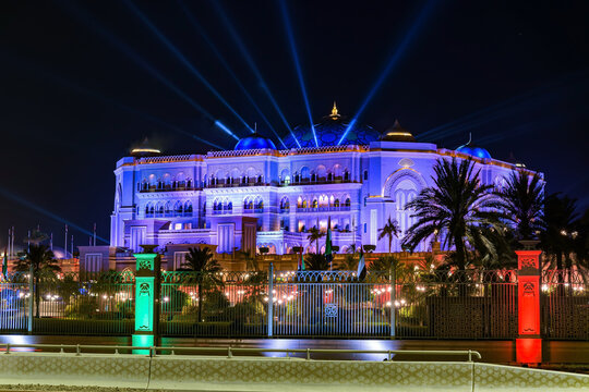 Emirates Palace Hotel illuminated with light beams during national celebration, Abu Dhabi