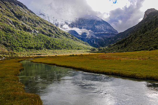 Majestic Snow Mountains and River Valley in Yading Nature Reserve

