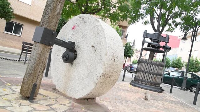 Rustic Olive Oil Press Machine in Operation, Historic Stone Mill Agricultural Process