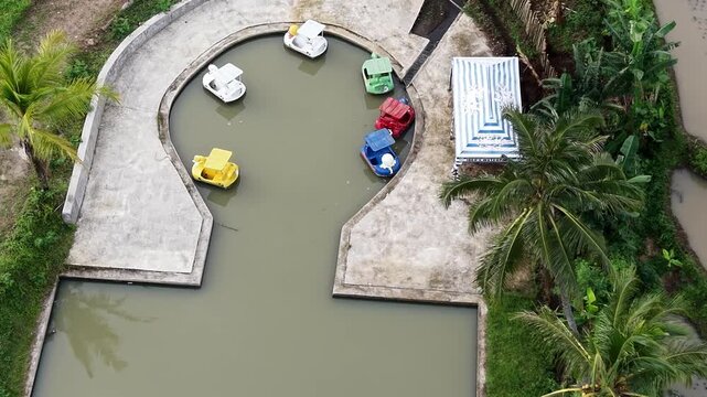 Aerial View of Colorful Pedal Boats at Tropical Water Park