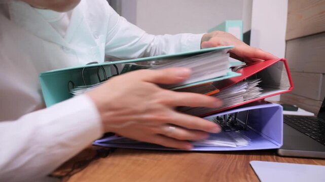 Burned out employee asleep at cluttered desk, overwhelmed by paperwork and fatigue, missing deadline and showing stress, exhaustion, and overwork in an office setting