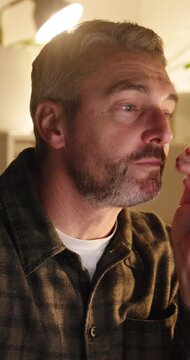 Headache, night or man in office with glasses, frustration or update mistake in task management. Fatigue, migraine pain or mature employee with tech, poor report review or overworked in late shift.