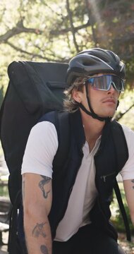 Outdoor, cycling and delivery man with bicycle for travel, supply chain and eco friendly transport. Sustainable shipping, logistics and cyclist with backpack for parcel drop off, safety and courier