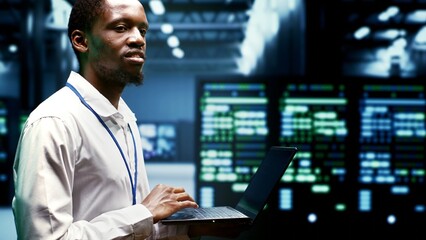 Fototapeta premium Technician inspecting cryptocurrency mining server clusters solving complex mathematical equations. Specialist in high tech facility housing blockchain technology high volume real time transactions